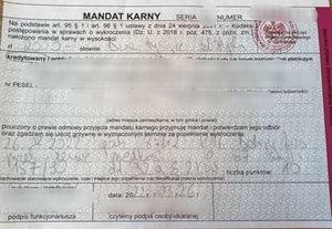 zdjęcie mandatu karnego na kwotę 2000 zł za przekroczenie prędkości